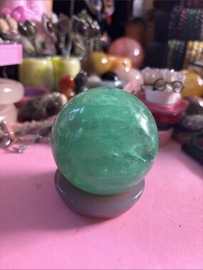 Polished Natural Green Fluorite Sphere on Stone Stand